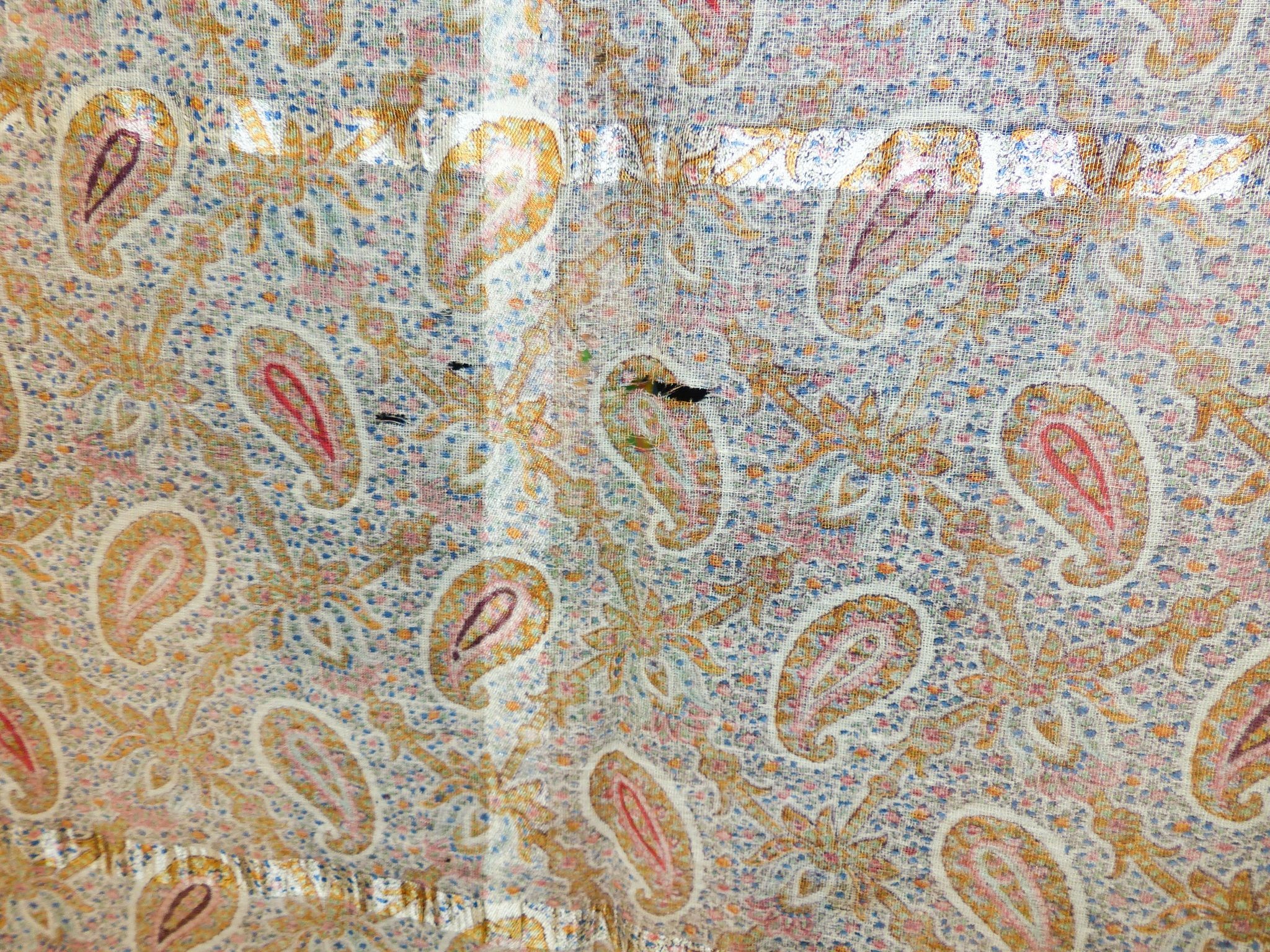 A Paisley pattern silk shaw (damaged) together with two Kelim woven bags (3)
